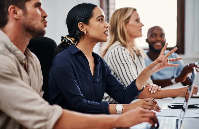 Team members collaborating during an AI bootcamp training session