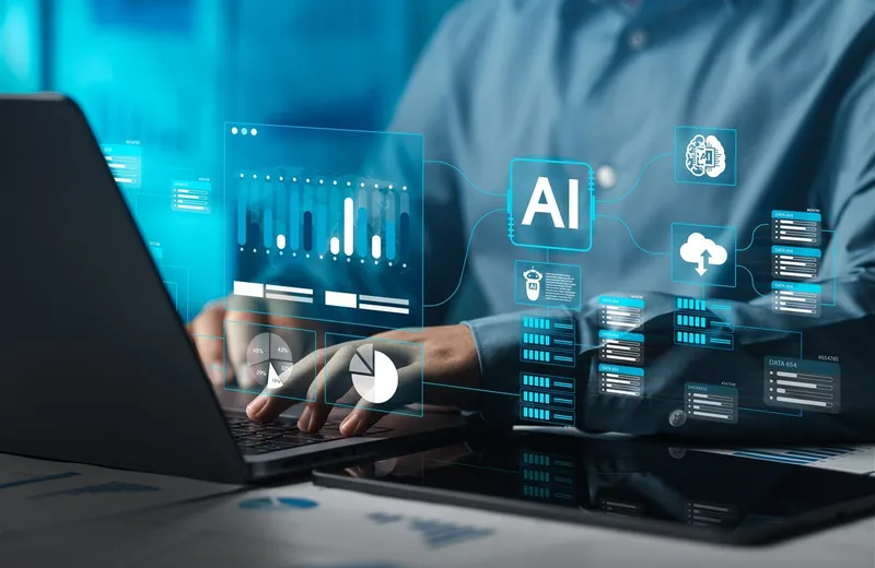 Professional reviewing an AI workflow and data assessment on a laptop